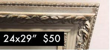 Load image into Gallery viewer, white classic frame 24 inches by 29 inches with beautiful roman like flowers around the center of this old style classic white frame