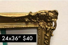 Load image into Gallery viewer, Museum like golden frame, 24 by 36 inches, with large flower decor on the corners  and smaller detailing around the inner edges.